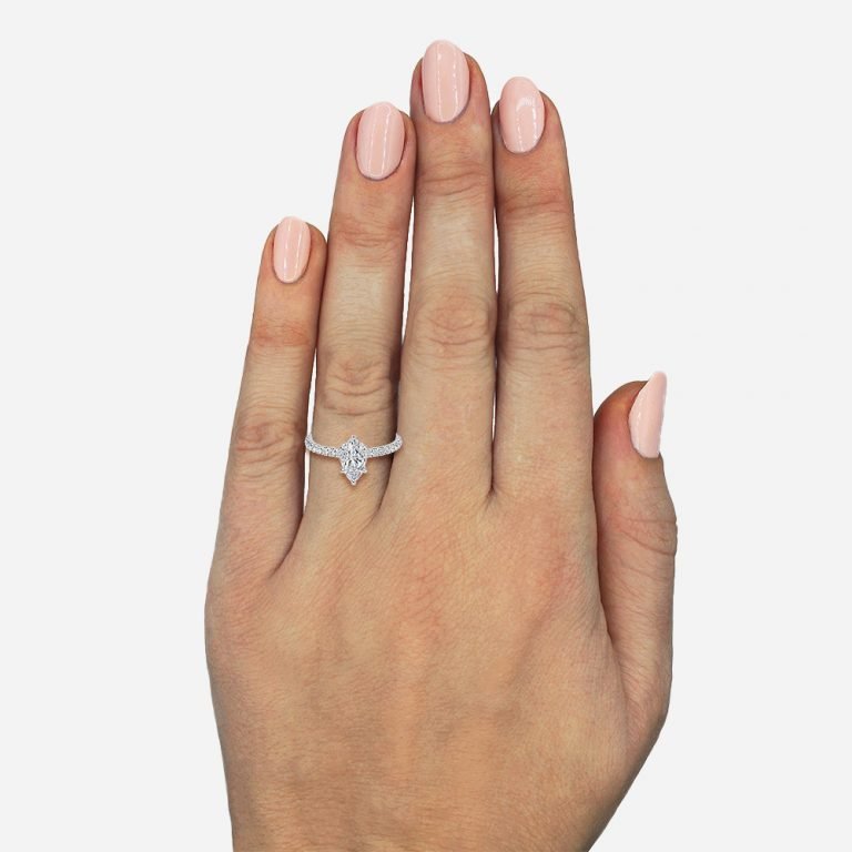 marquise cut hidden halo engagement ring on hand