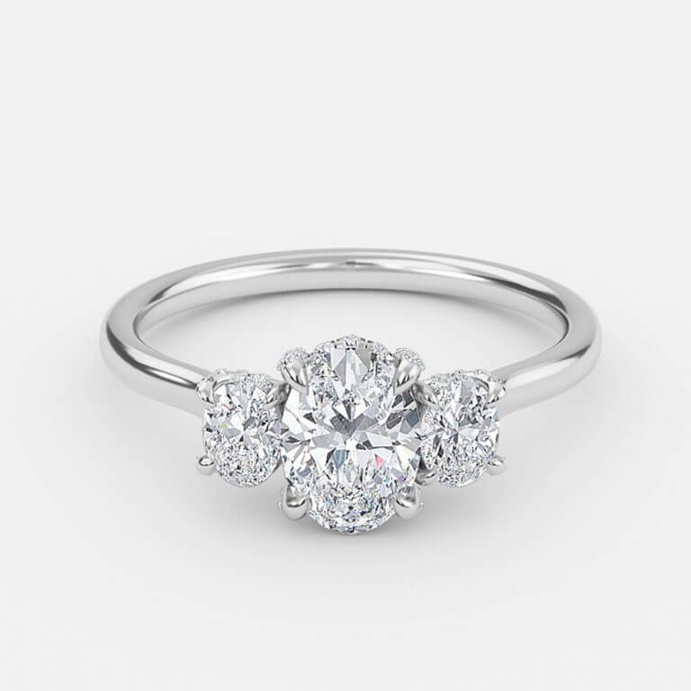 oval three stone diamond ring