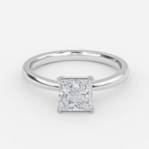 Esme princess cut white gold solitaire ring, front view showing 4-prong claw setting on tapered plain band