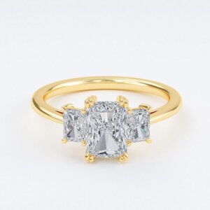 Cami radiant cut yellow gold three stone ring, front view showing radiant centre and matching radiant side stones