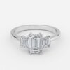 three stone emerald cut diamond ring platinum