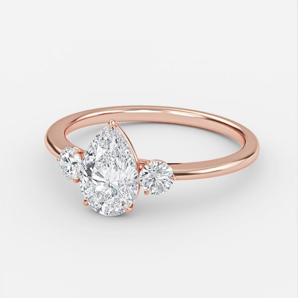 lab created three stone pear diamond engagement ring