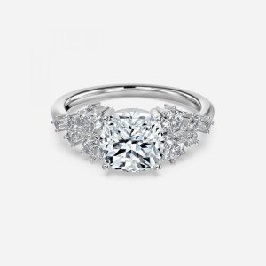 Jessica cushion cut white gold cluster ring, front view showing starburst round and baguette accent clusters