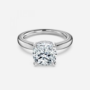 Essian cushion cut white gold hidden halo ring, front view showing clean solitaire look with hidden halo beneath