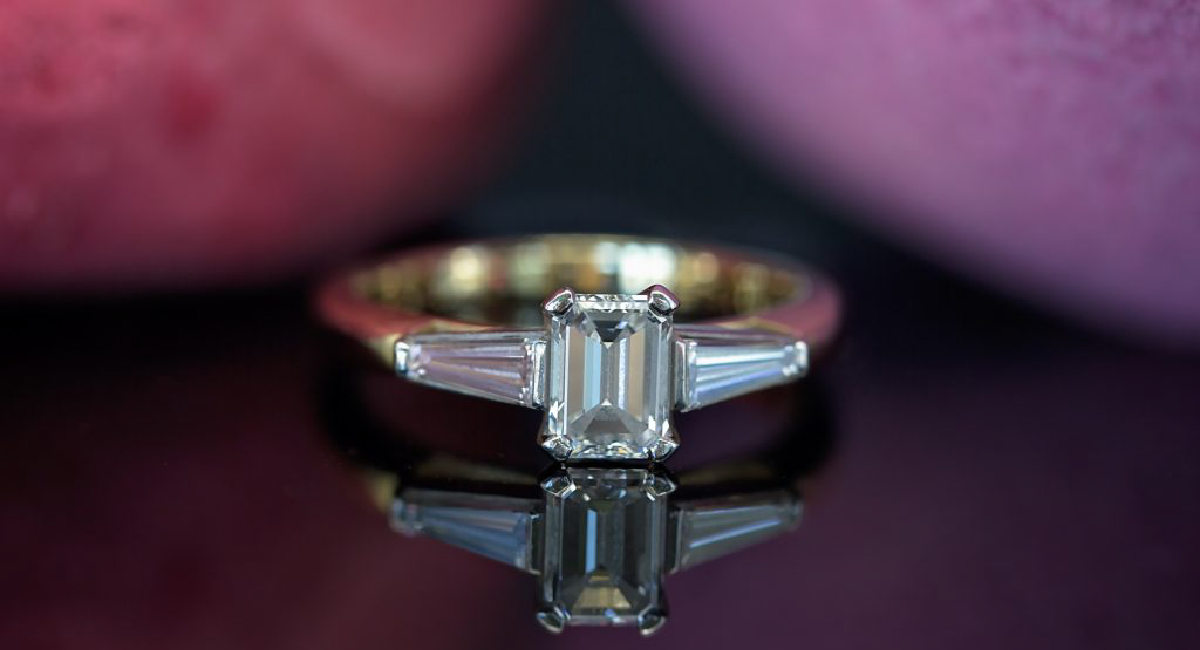 baguette cut diamond three stone engagement ring