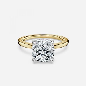Vina cushion cut yellow gold two-tone hidden halo ring, front view showing yellow gold band and yellow metal head