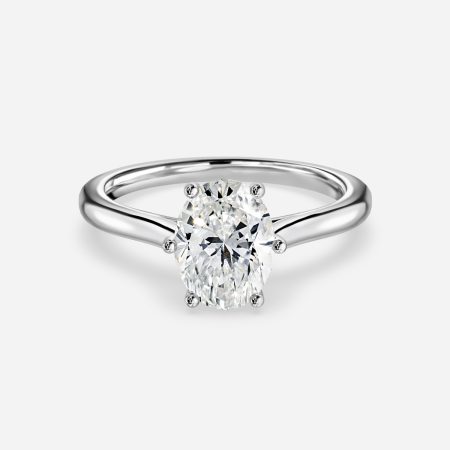 Nimi oval cut white gold solitaire ring, front view showing 6-prong double-claw on elongated diamond