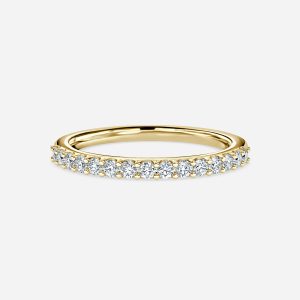 Lark round lab grown diamond shared prong half eternity wedding ring in yellow gold