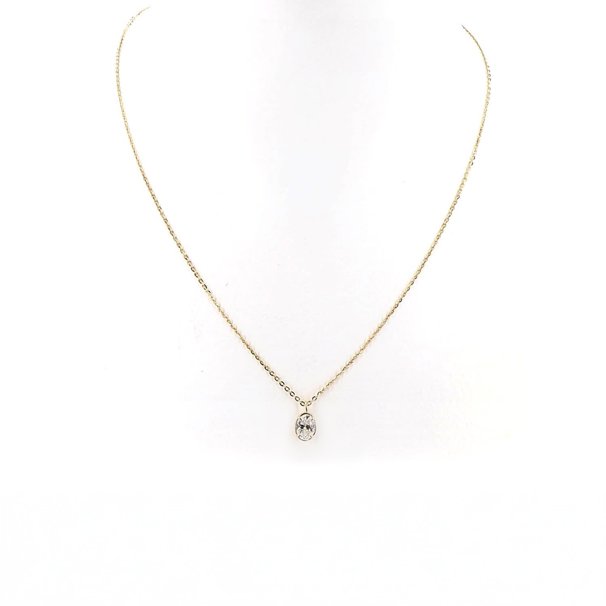 Oval Lab Grown Diamond Bezel Prong Pendant In 14K Yellow Gold