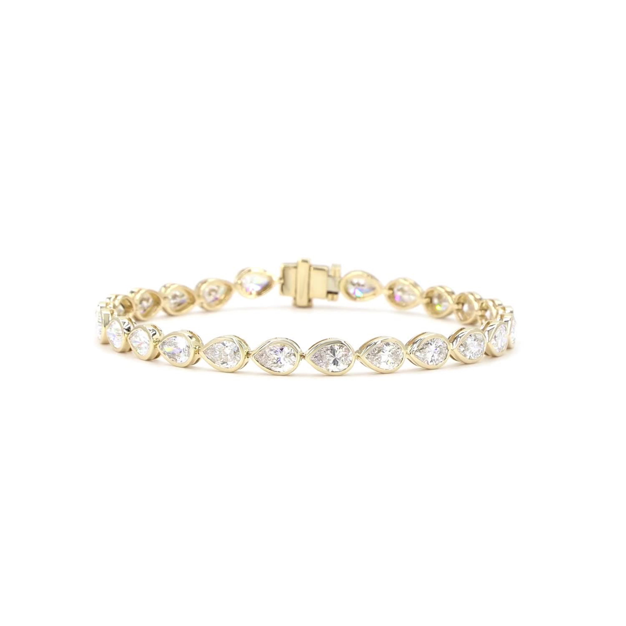 Pear Cut Lab Grown Diamond Bezel Tennis Bracelet In 14K Yellow Gold