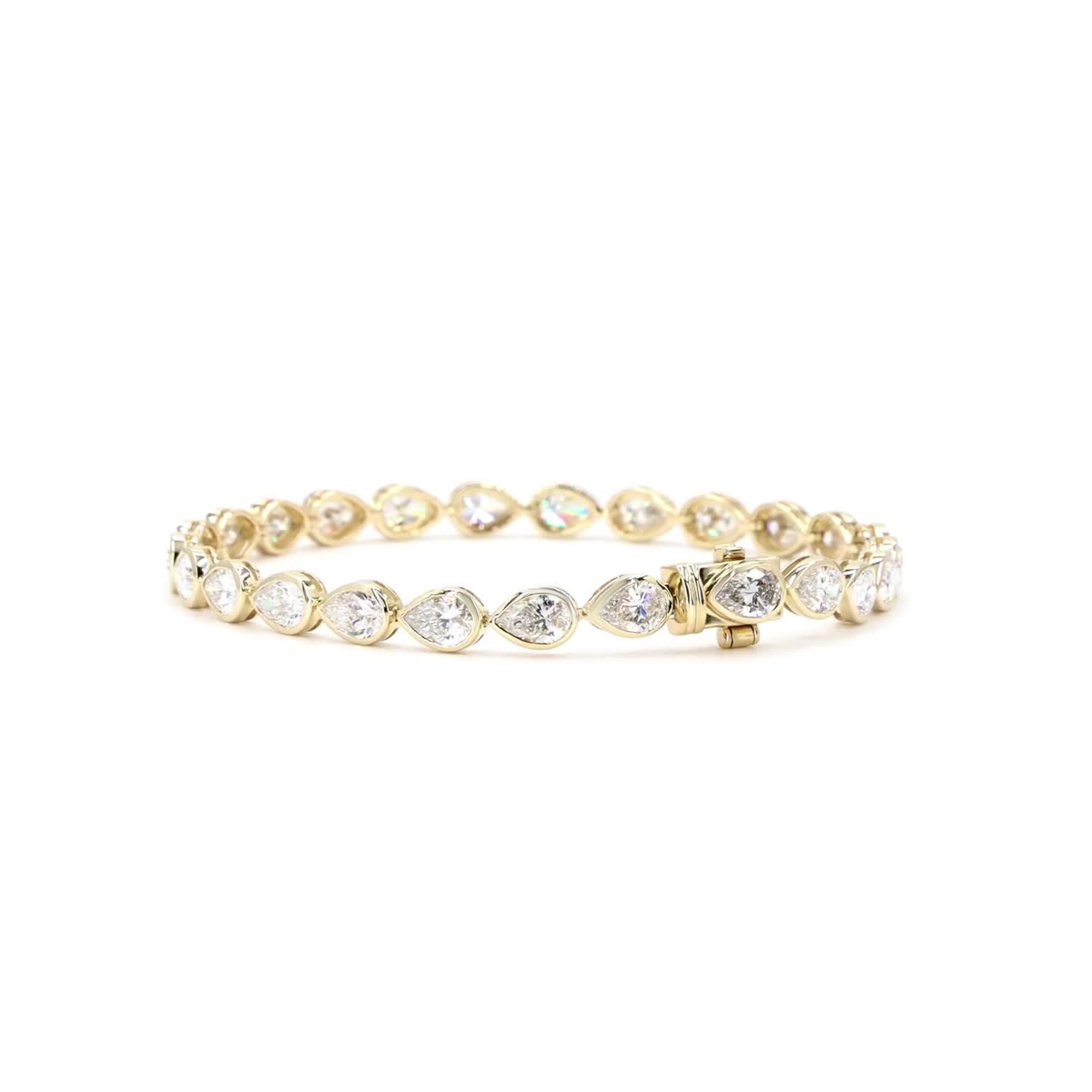 Pear Cut Lab Grown Diamond Bezel Tennis Bracelet In 14K Yellow Gold