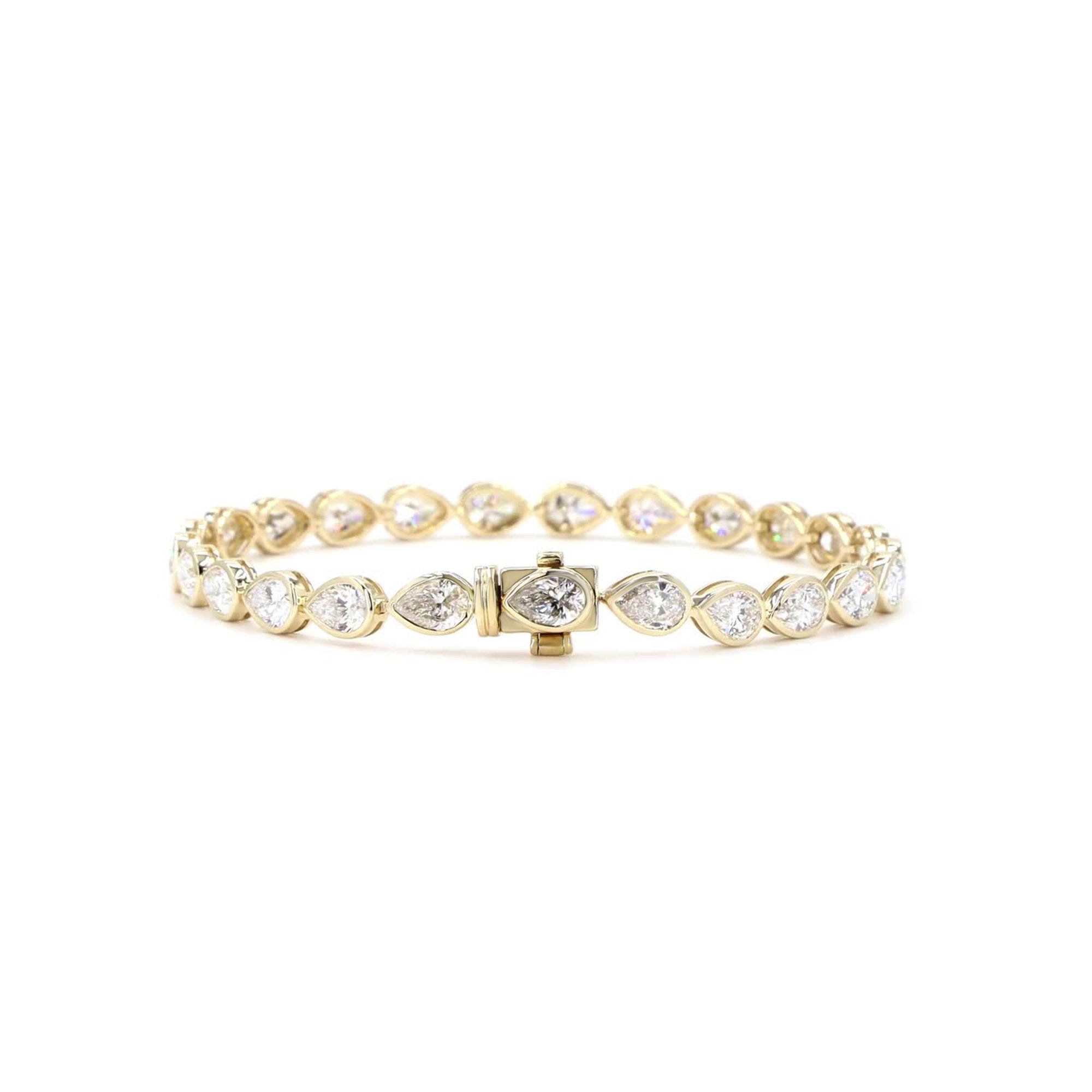 Pear Cut Lab Grown Diamond Bezel Tennis Bracelet In 14K Yellow Gold