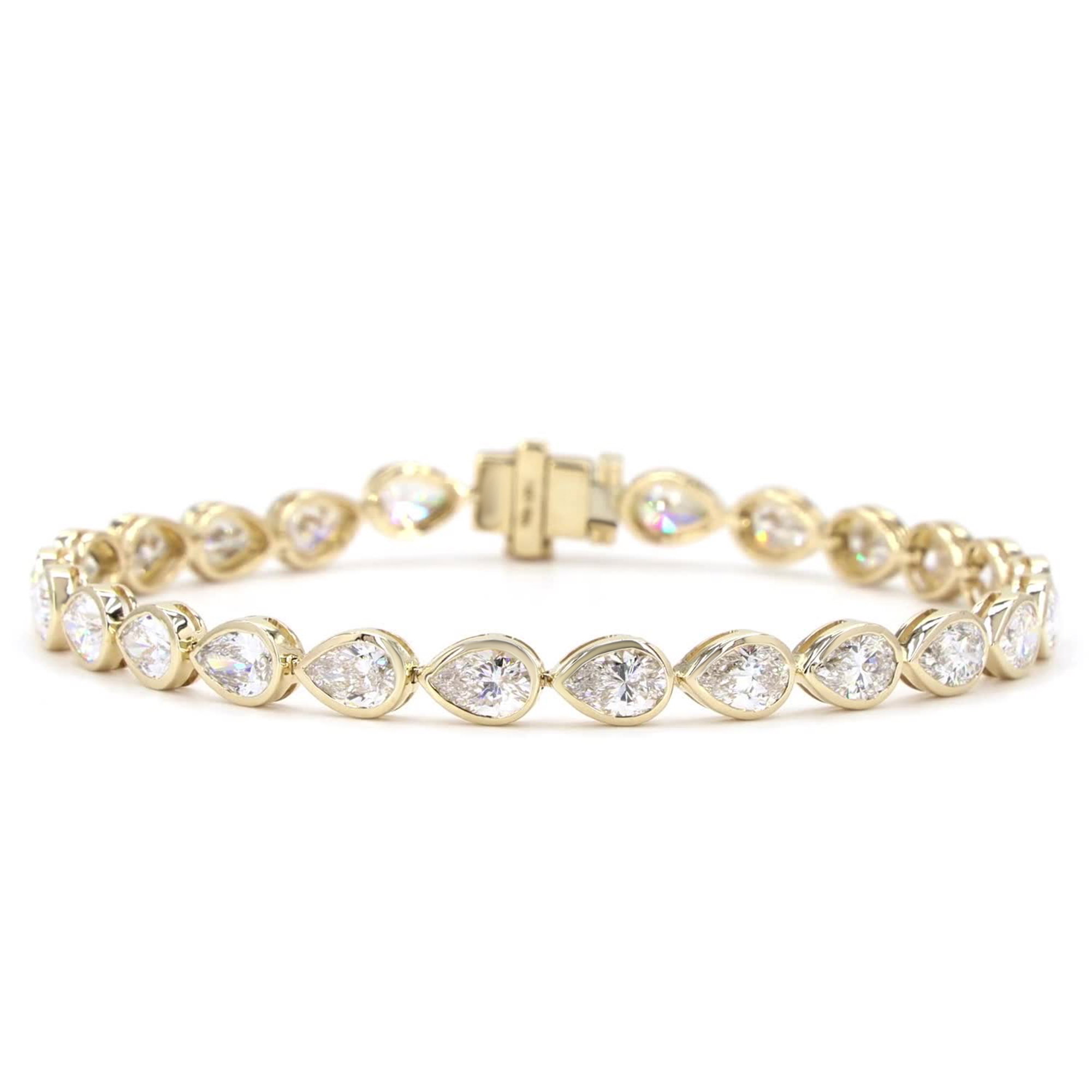 Pear Cut Lab Grown Diamond Bezel Tennis Bracelet In 14K Yellow Gold