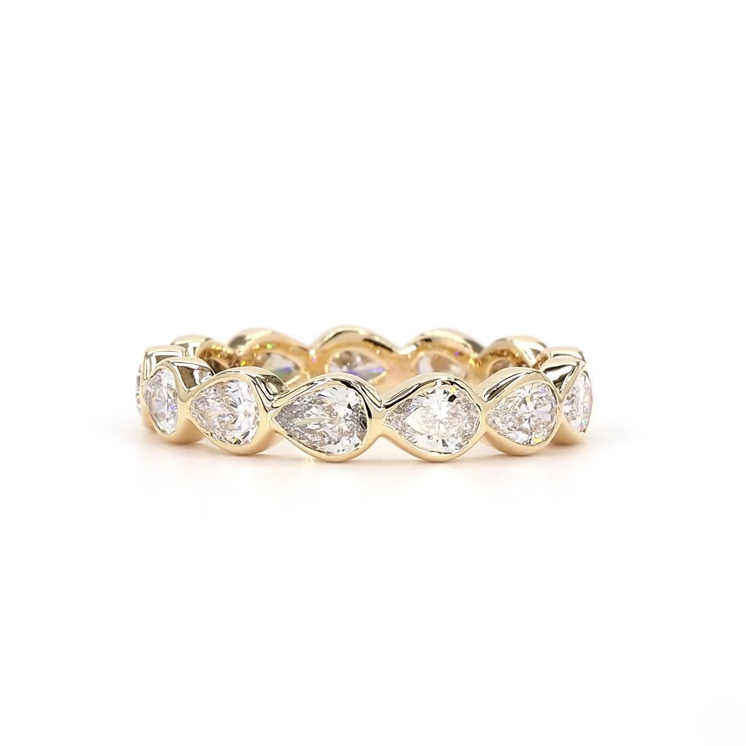 Pear Bezel Full Eternity Ring In 14K Yellow Gold