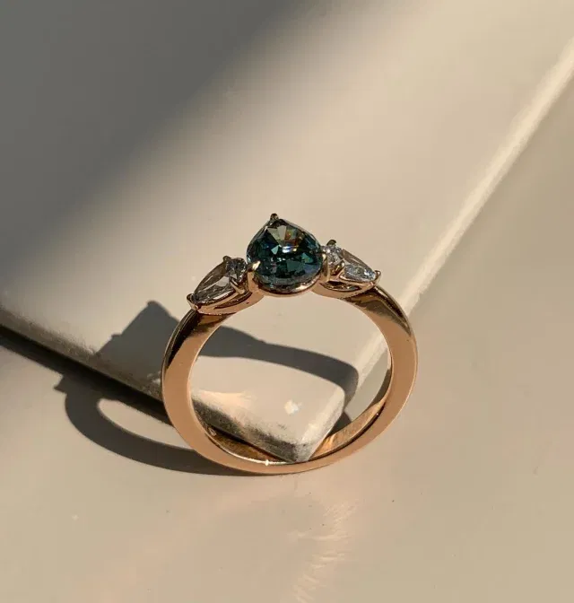 1.40Ct Renai Pear Three Stone Engagement RingCelebrate love with the 1.40Ct Renai Pear Three Stone Engagement Ring in 18K Rose Gold.(LGDPR-51)#pear #engagementring #ring #diamond #gift #diamondring #ring #pearcut #gold #labgrowndiamond